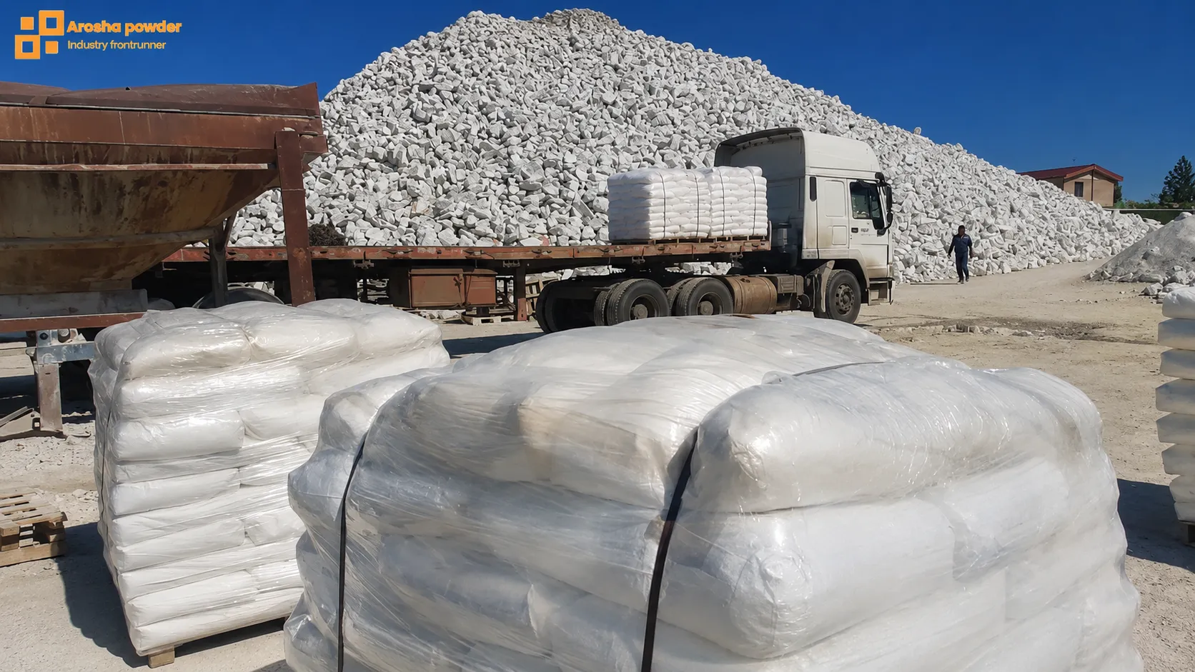 Calcium carbonate powder packaging and loading operation at Arosha Powder facility